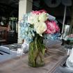 Blue Hydrangea and white rose centerpiece