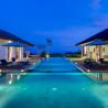 Pandawa Cliff Estate Villa - Villa Marie the pool lit up at night